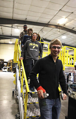 Fergus High School students walk down a Spika platform